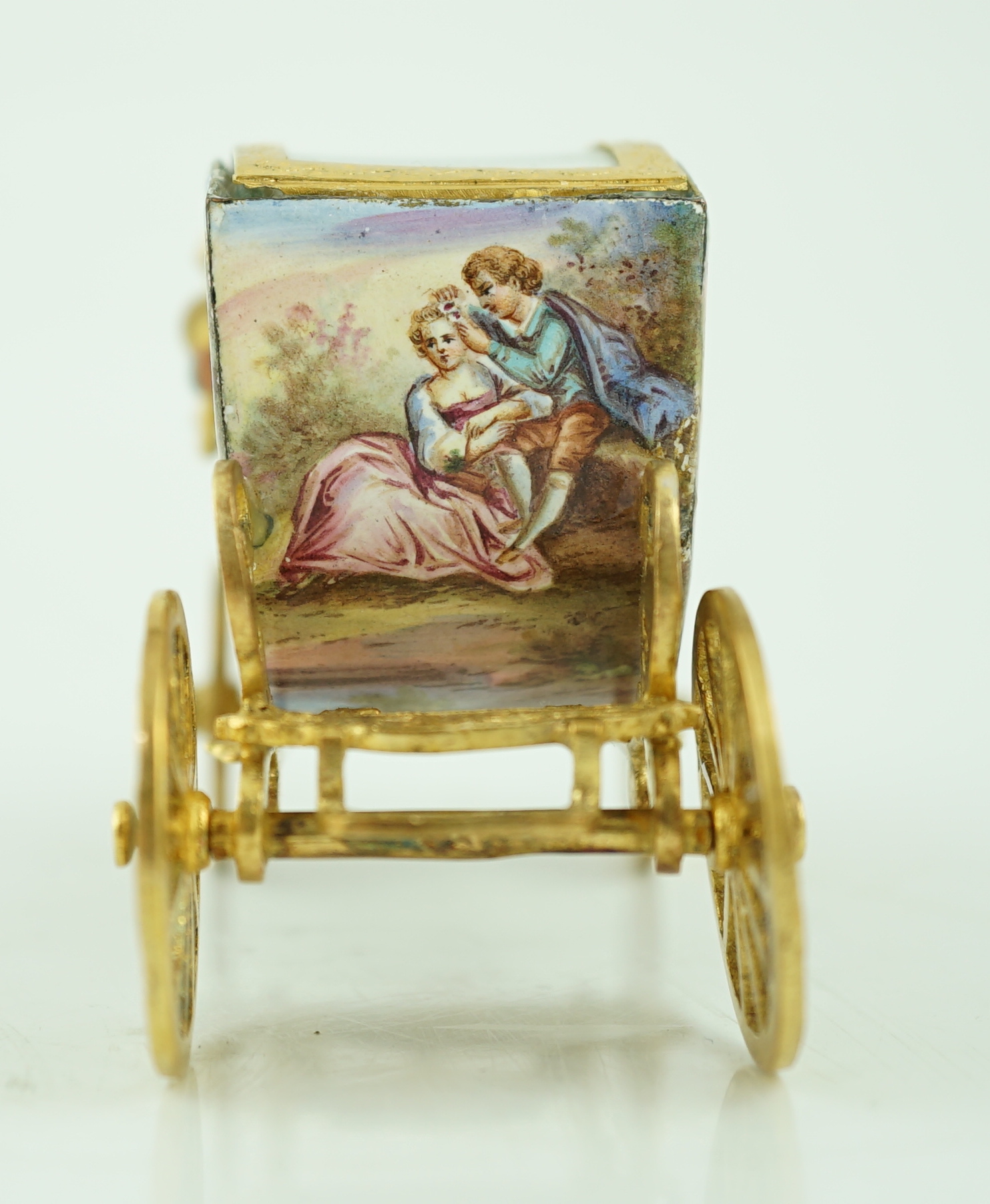 An early 20th century Viennese silver gilt and enamel miniature model of carriage, by Ludwig Pollitzer?